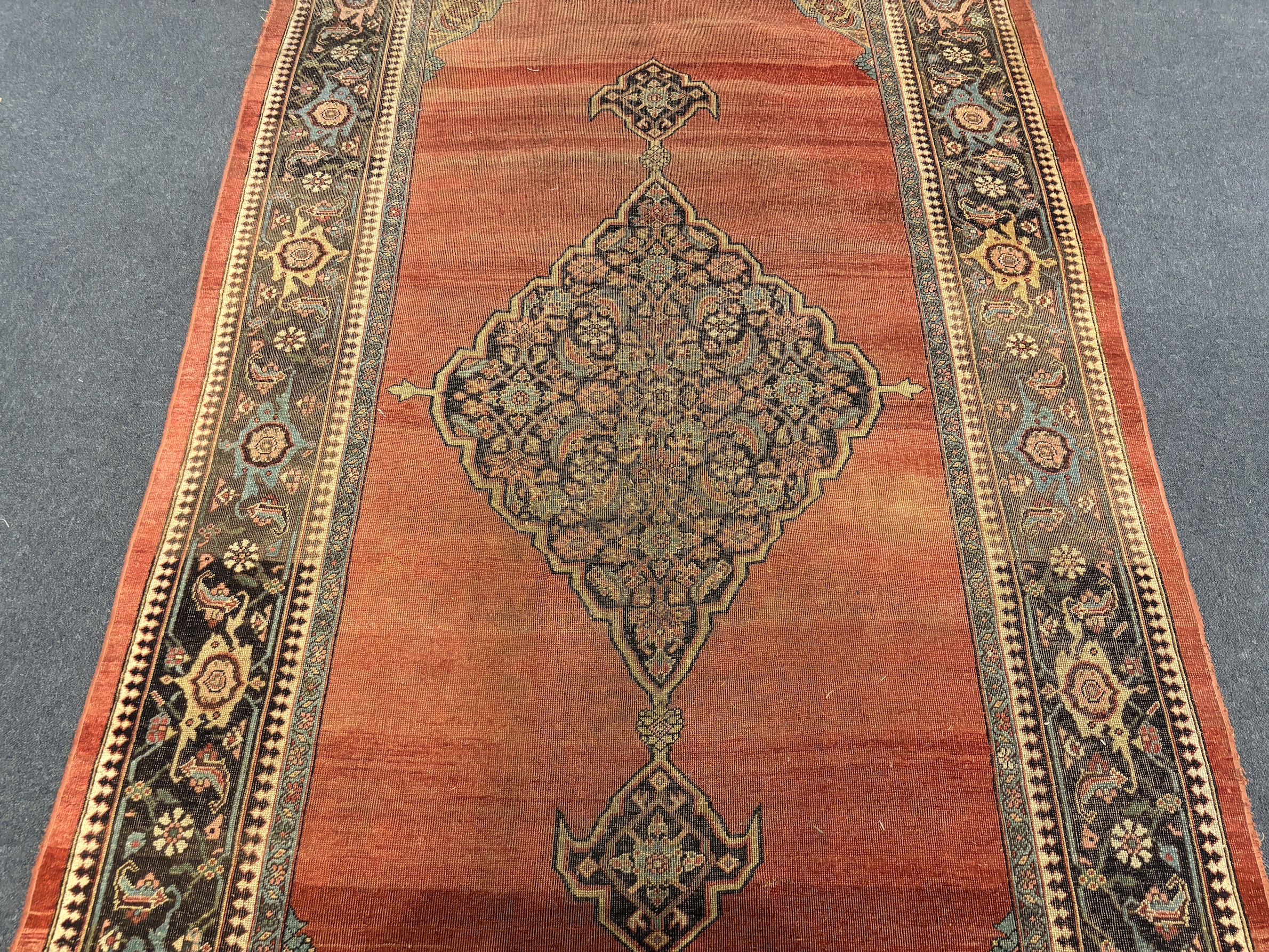 An antique Bidjar carpet 365 x 185cm